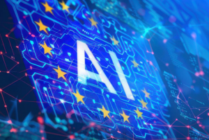 Digitales Konzeptbild mit dem Schriftzug „AI“ in leuchtenden Buchstaben, umgeben von einer blauen Schaltkreisstruktur. Gelbe Sterne symbolisieren eine Verbindung zur Europäischen Union, während rote Netzwerkverbindungen im Hintergrund zu sehen sind.
